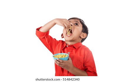 Asian Child Eating Delicious Noodle, Indian Kid Eating Noodles On White Background