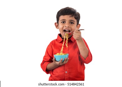 Asian Child Eating Delicious Noodle, Indian Kid Eating Noodles With Fork On White Background