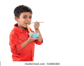 Asian Child Eating Delicious Noodle, Indian Kid Eating Noodles With Fork On White Background