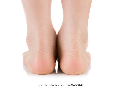 Asian child foot. Studio shot. on white background
