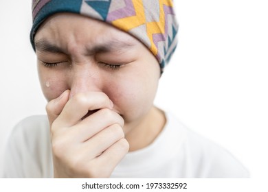 Asian Child Girl Covers Her Head With A Cloth,lady Suffering From Disease Of Acute Leukemia Cancer,Depressed Stressed Female Patient Crying Feeling Tired And In Pain From Cancer Chemotherapy Treatment