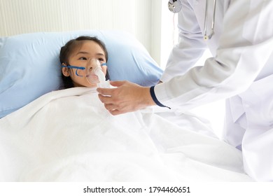 Asian Child Girl Patient Receiving Artificial Ventilation In Hospital