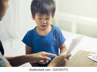 Asian Child Or Kid Or Little Boy To Study, Learning And Play Together With Mother Or Mom For Education At Home. Include Woodden Table, Drawing Paper. Concept Of Family, Teach, Babysitter, Kindergarten