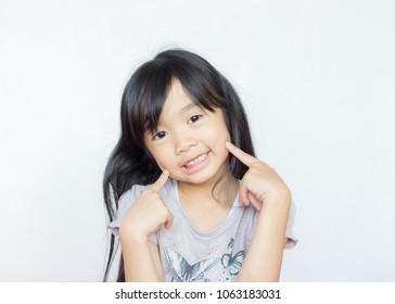 Asian Child Point Her Cheeks Smile Stock Photo 1063183031 | Shutterstock