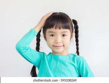 Asian Child Point At The Part Of Body, She Point At Her Head