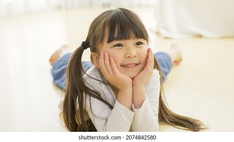 Asian child in the room - Powered by Shutterstock