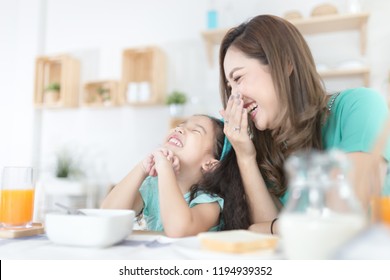 Asian Children And Her Mom Have A Breakfast In The Morning, Child Nutrition And Development, They Laughing And Feeling Happy In Family Time