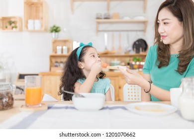 Asian Children And Her Mom Have A Breakfast In The Morning, Asian Children Don't Want To Eat, Child Nutrition And Development, They Feeling Happy In Family Time, Anorexia