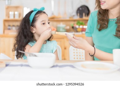 Asian Children And Her Mom Have A Breakfast In The Morning, Asian Children Don't Want To Eat, She Use Her Hand Close Her Mouth, Child Nutrition And Development, Anorexia