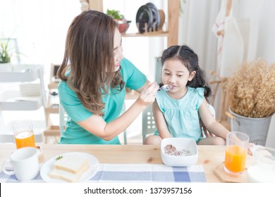 Asian Children And Her Mom Have A Breakfast In The Morning, Asian Children Don't Want To Eat, Child Nutrition And Development, They Feeling Happy In Family Time, Anorexia