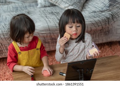 Asian Children Learning Make Up On Her Skin With Brush By Themselves, Make-up Artist Concept