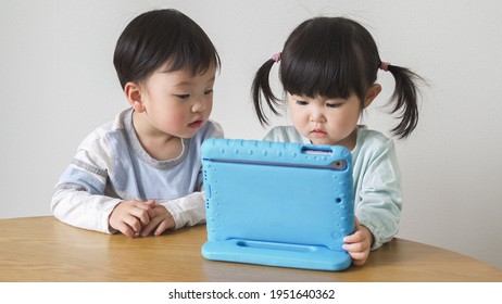 Asian Children Watching Tablet Computer