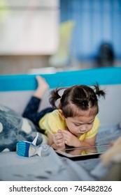 Asian Children Watching Tablet  / Playing Phone And Looking At Cartoon / Kid Play Tablet
