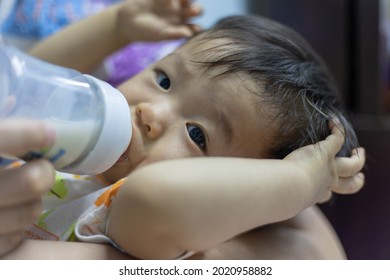 Asian Chinese Baby Boy Drinking Milk