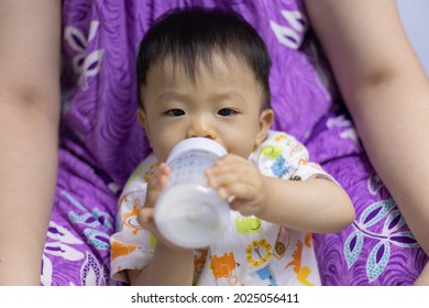 Asian Chinese Baby Boy Drinking Milk