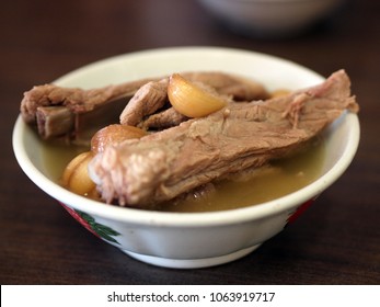 Asian - Chinese Food called Bak kut teh : a pork rib dish cooked in broth popularly served in Malaysia and Singapore and Southern Thailand where there is a predominant Hoklo and Teochew community.