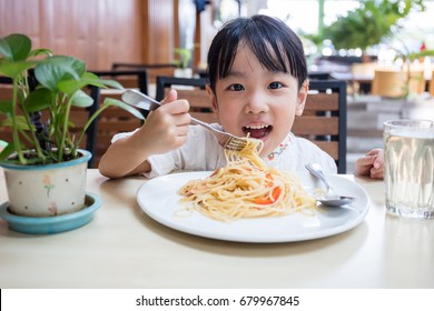 Asian Chinese Little Girl Eating Spaghetti Stock Photo 679967845 ...