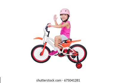 Asian Chinese Little Girl Riding Bicycle In Isolated White Background