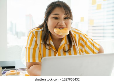 Asian Chubby Woman Enjoy Unhealthy Eating Sweet Dessert Donut With Friends In Office.