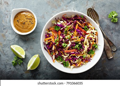 Asian cole slaw with sesame and peanut butter dressing