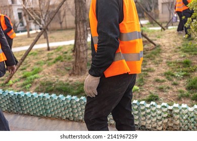 Asian Community Workers, Community Workers Wearing Orange Vests, Garden Workers, Old People Working, Old Chinese Workers In The Yard, People In Reflective Vests, Cutting Trees, Taking Care Of The Yard