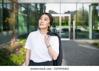 Asian Confident Business Woman In Suit, Looking Up To The Bright Future Of Her Career Opportunities. Job, Work Aspirational Banner, Background Of Office Center. Business People Lifestyle. Copy Space