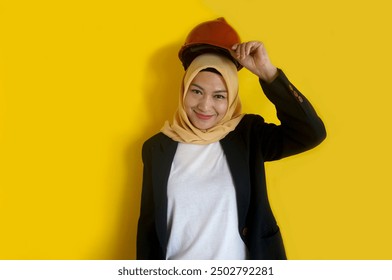 Asian Construction Worker Muslim Woman Doing Hats Off With Smile - Powered by Shutterstock