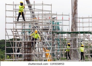 Asian Construction Workers Working On Scaffolding Stock Photo ...