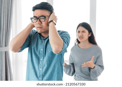 Asian Couple Arguing At Home