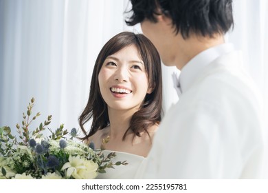 Asian couple getting married. Bridal photo. Photo wedding. Photo studio. - Powered by Shutterstock