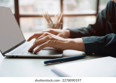 Asian couple looking laptop with happy together in the home. Success of lovers in front of a notebook. Happy couple on social online with a laptop. - Shutterstock ID 2278090197