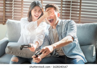 Asian Couple Lovers Enjoy And Play Console Game On Vacation Make More Quality Time Of Happiness Together At Home