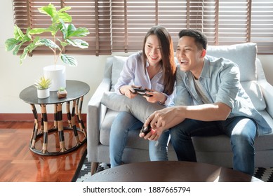 Asian Couple Lovers Enjoy And Play Console Game On Vacation Make More Quality Time Of Happiness Together At Home