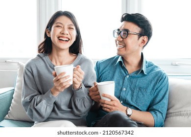 asian couple pictures at home - Shutterstock ID 2120567342