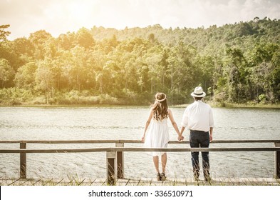 Asian Couple With Pre Wedding Sceen Out Door Tree Background.,asian Lover