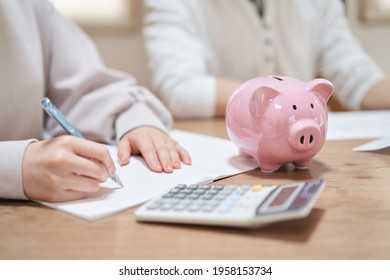 Asian Couple Reviewing Household Budget