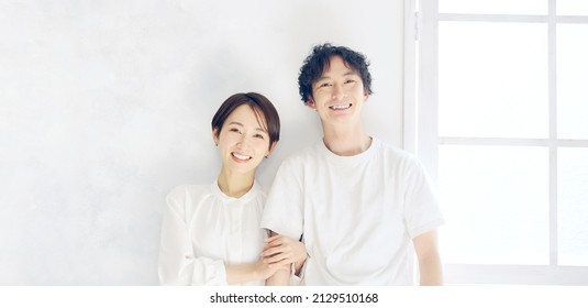 Asian couple in the room. Beauty concept. Skin care. Cosmetics.