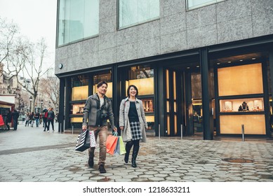 Asian Couple Shopping In Barcelona