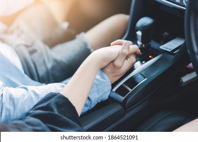 Asian couple traveling close up holding hands holiday vacation road trip nature forest mountain tracking, inside car together driving, happy freedom love lifestyle, through romantic sunset journey - Powered by Shutterstock