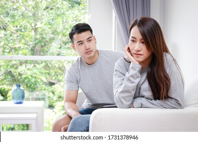 Asian Couples Quarreling With Their Wives, Feeling Sad, Do Not Trust Their Husbands To Talk, Do Not Know About. Married Couple Concept