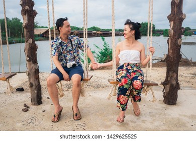 Happy Young Asian Couple On Swing Images Stock Photos Vectors Shutterstock