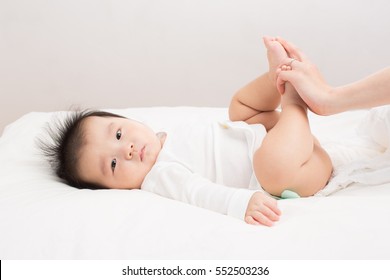 Asian Crawling Baby Changing Diaper