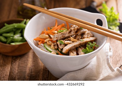 Asian Cuisine Chicken Salad With Rice Noodles, Carrot And Peanuts