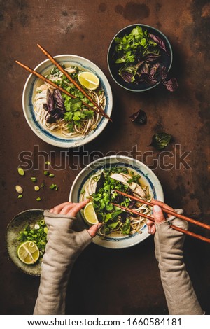 Similar – Image, Stock Photo Bowl of Asian Noodle Soup with chopsticks