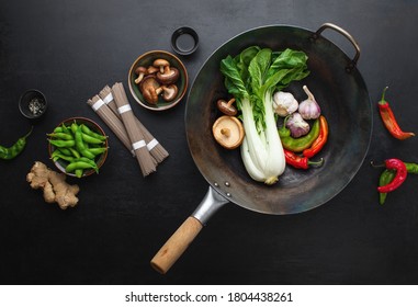 Asian Culinary Ingredients With Wok On A Dark Surface, Asian Food Concept, Top Down View