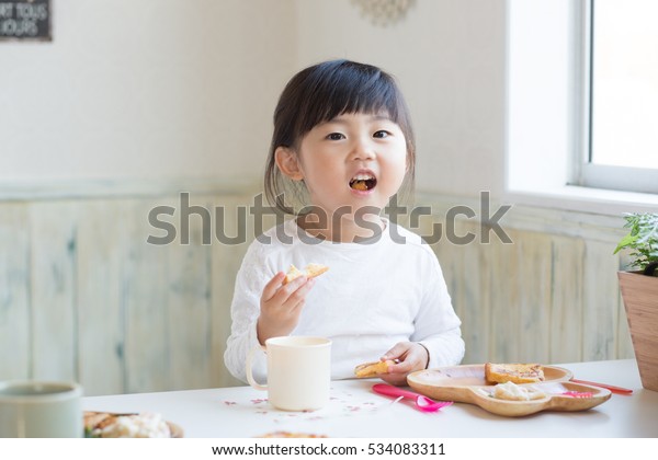 Asian Cute Girl Having Breakfast Stock Photo (Edit Now) 534083311