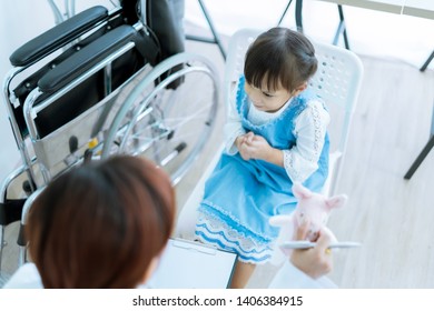 Asian cute girl visiting a doctor - Shutterstock ID 1406384915