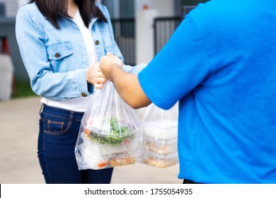 Asian Delivery Man Delivering Food, Fruit, Joice And Vegetable To Customer Home - Online Grocery Shopping Service Concept