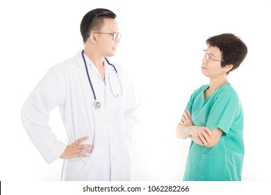 Asian Doctor Talk With Nurse About Patient Information , Knowledge Sharing