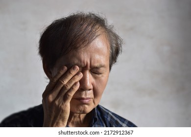 Asian Elder Man Rubbing His Eye. Concept Of Eye Strain Or Itchy Eyelid.